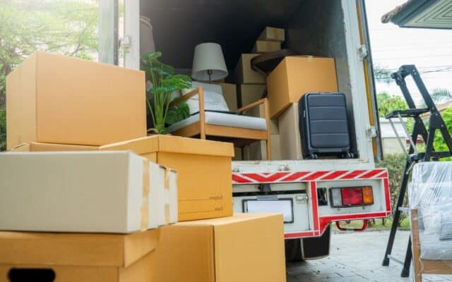 moving truck with boxes and furniture.