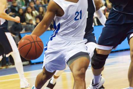 Two California college basketball teams competing on the court