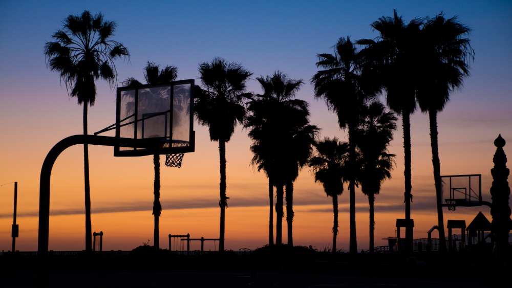 Basketball court in California during sunset