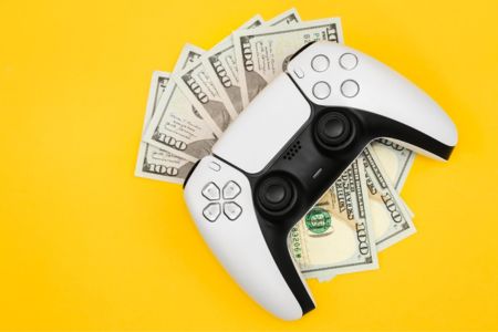 Gaming controller with one hundred dollar bills