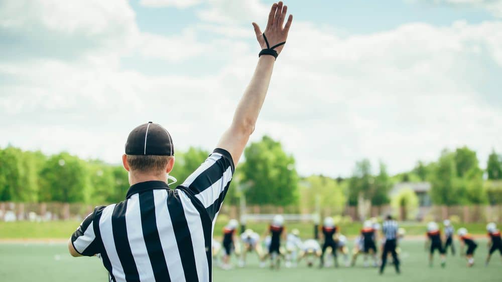 football referee at football game 