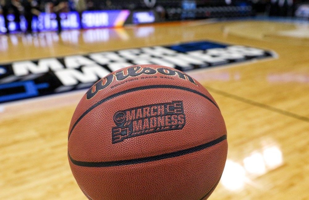 A NCAA basketball that says March Madness on it, representing March Madness jobs