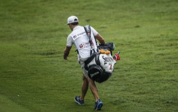 Caddie performing his PGA tour championship job