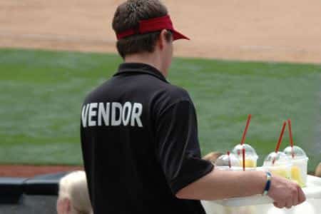 A vendor at the Super Bowl selling drinks