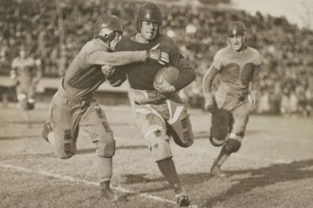 Vintage football players in action