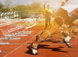 Runners running on a track with computer visualization displaying AI.