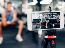 man recording himself in the gym