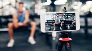 man recording himself in the gym