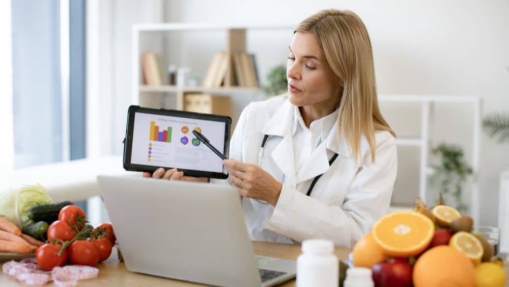 A nutritionist giving an online consultation.