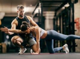 Sports trainer working with an athlete.