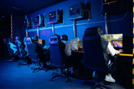 people playing esports in a gaming cafe