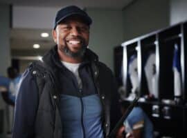 sports team manager in locker room