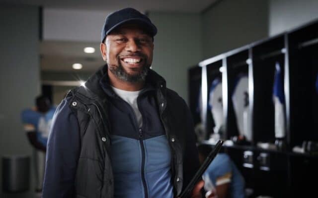 sports team manager in locker room